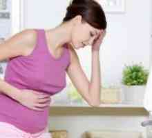 Защо стомахът ме боли по време на ранна бременност?